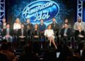 O vencedor do 'American Idol' cai no palco em Irronic aceno para o seu último título de álbum