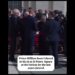 Prince William been Ushered to his sit at St Peters  Square for the late popes funeral.