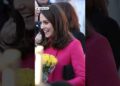 Pregnant Kate was presented with multiple bunches of flowers