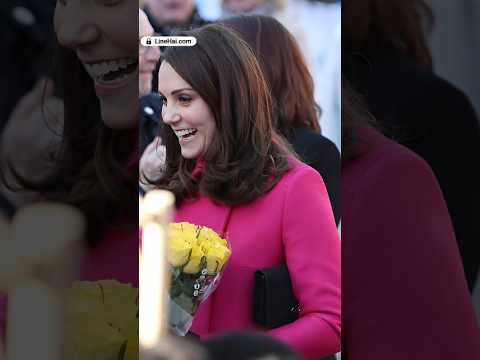 Pregnant Kate was presented with multiple bunches of flowers