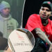 Chris Brown prendeu por esmagar a garrafa de tequila sobre a cabeça do produtor musical na boate: relatório