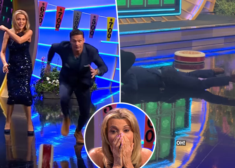 Ryan Seacrest Face-Plants, apresentador de 'Wheel of Fortune, enquanto tenta fazer truques no show