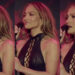 Ajuda, um gigante críquete rastejou até o pescoço de J.Lo no meio do concerto