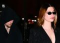 Hailey Bieber usa um minivestido preto de baixo corte até hoje com Justin Bieber