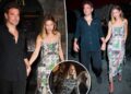 Gigi Hadid segura as mãos com Bradley Cooper enquanto eles celebram sua capa da Vogue em Nova York