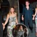 Gigi Hadid segura as mãos com Bradley Cooper enquanto eles celebram sua capa da Vogue em Nova York