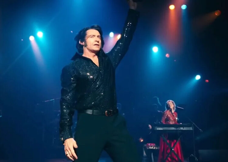 Hugh Jackman brilha como um imitador de diamante Neil na música Sung Blue Trailer