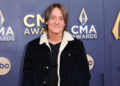 A mulher misteriosa teria o centro da divisão de casamento de Keith Urban