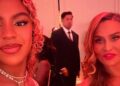 Blue Ivy usa vestido rosa e penas para baile de anjo com Tina Knowles