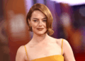 Emma Stone impressiona com vestido Louis Vuitton amarelo mostarda no BFI Festival