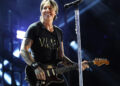 Keith Urban muda Nicole Kidman 'letra' letra para 'guitarrista de Maggie'