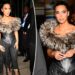Kim Kardashian oferece glamour medieval em espartilho de pele vintage com franjas que vão até o chão