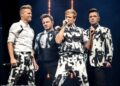 Westlife encanta os fãs ao confirmar que Mark Feehily 'ainda faz parte da banda' e aparece em sua nova música, apesar do problema de saúde... enquanto anunciam turnê e álbum épicos