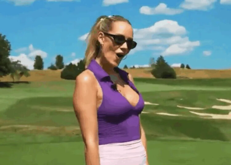 Paige Spiranac chama a atenção usando uma blusa roxa profunda e brinca atrevidamente sobre 'boas notícias'