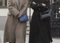 Princesses Beatrice and Eugenie share an emotional hug after intense conversation on a Mayfair street as disgraced father Andrew was officially stripped of his royal titles