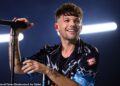 Louis Tomlinson 'joga sombra' em Harry Styles enquanto os dois ex-cantores do One Direction se preparam para lançar novas músicas no mesmo dia em meio a uma rivalidade acalorada
