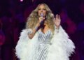 As críticas são sobre Mariah Carey cantando 'Volare' na cerimônia de abertura olímpica