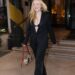 Dakota Fanning experimenta a tendência do sutiã exposto durante a Semana da Moda de Milão