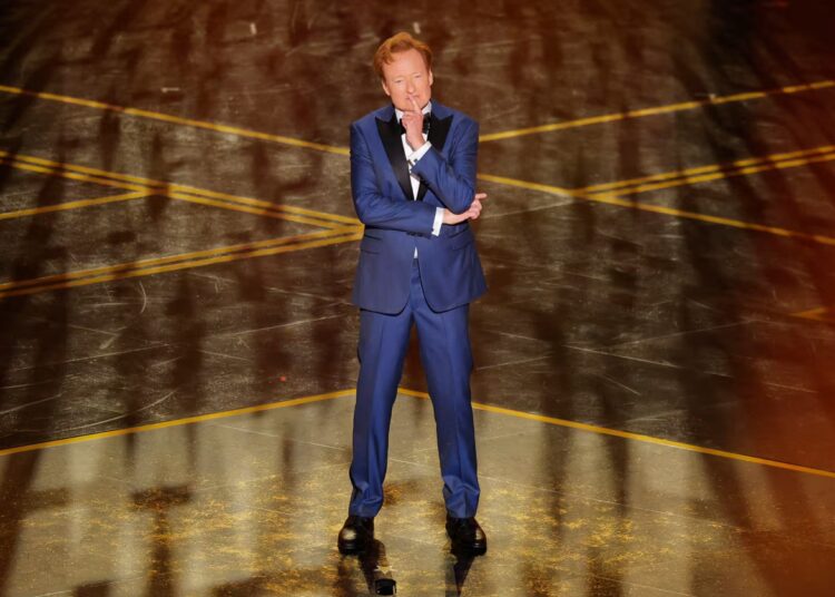 Atualizações ao vivo do Oscar 2026: 'Sinners' e 'One Battle After Another' se enfrentam com vitórias de roteiro; Anfitriões de Conan O'Brien