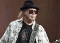 Neil Young teases new music amid ‘sad and depressing times’