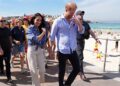 A viagem do príncipe Harry e Meghan à Austrália contrasta com a visita de estado do rei Charles aos EUA