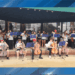 Orquestra da Thomas Jefferson Middle School se apresenta antes do confronto Cardinals-Royals