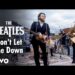 Which songs did The Beatles play at their famous “rooftop” concert?