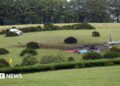 As investigações de acidente de helicóptero da Marinha Real continuam em Devon