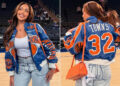O prefeito de Nova York, Zohran Mamdani, posa com a bolsa laranja 'Lucky' de Jordyn Woods na parada do campeonato dos Knicks
