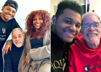 Sinbad sorri ao ser abraçado pelo filho Royce e pela filha Paige após seu derrame em 2020