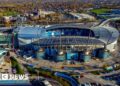 Último estágio da zona de entretenimento perto do terreno do Man City