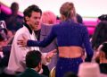Por que Harry Styles não estava com Zoë Kravitz no casamento de Taylor Swift