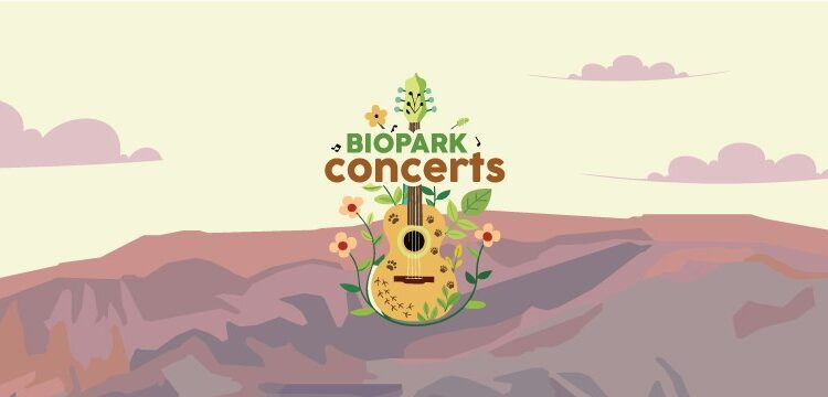 2026 Conciertos BioParque Estandarte montañas y una guitarra.