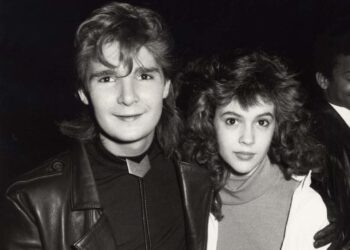 Actors Corey Feldman and Alyssa Milano during the 1987 American Music Awards in Los Angeles. -