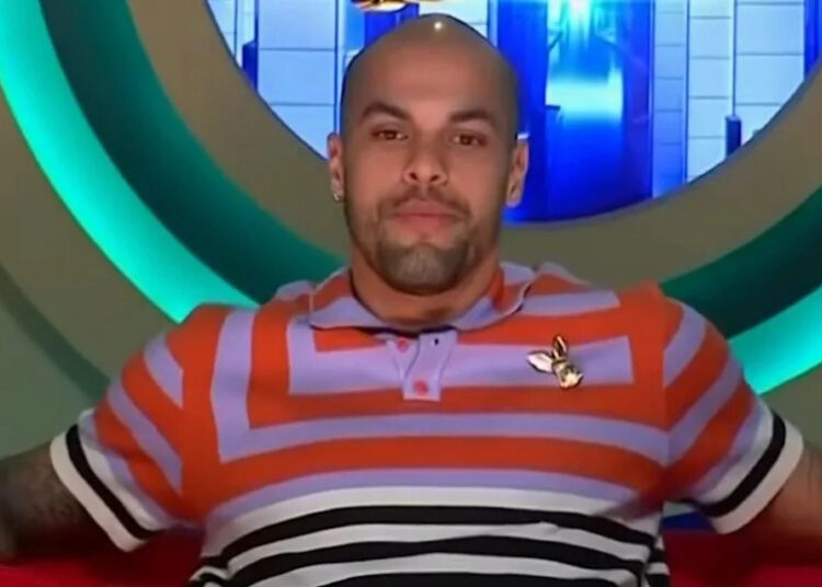 Josh getting ready to cast his vote in the diary room.