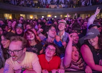 Fans smile in the front row of the Twin Peaks show at Thalia Hall on May 14, 2026