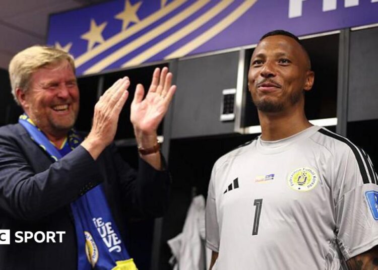 King Willem-Alexander of the Netherlands and Curacao goalkeeper Eloy Room