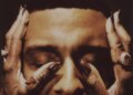 The striking album artwork for "Fix Your Face" was inspired by Masego wanting to evoke the feeling of finding "comfort in those times where you couldn't express it," like in the arms of your grandmother. "I kind of tapped into that energy and that memory that I would have,” he said.