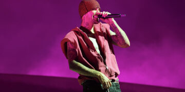 INDIO, CALIFORNIA - APRIL 18: (Exclusive Coverage) (FOR EDITORIAL USE ONLY) (NOT TO BE LICENSED FOR ANY STANDALONE OR SPECIAL INTEREST BOOK PUBLISHING USE CONCERNING THE COACHELLA MUSIC FESTIVAL AND/OR STAGECOACH MUSIC FESTIVAL) Justin Bieber performs at the Coachella Stage during the 2026 Coachella Valley Music and Arts Festival at Empire Polo Club on April 18, 2026 in Indio, California. (Photo by Kevin Mazur/Getty Images for Coachella)